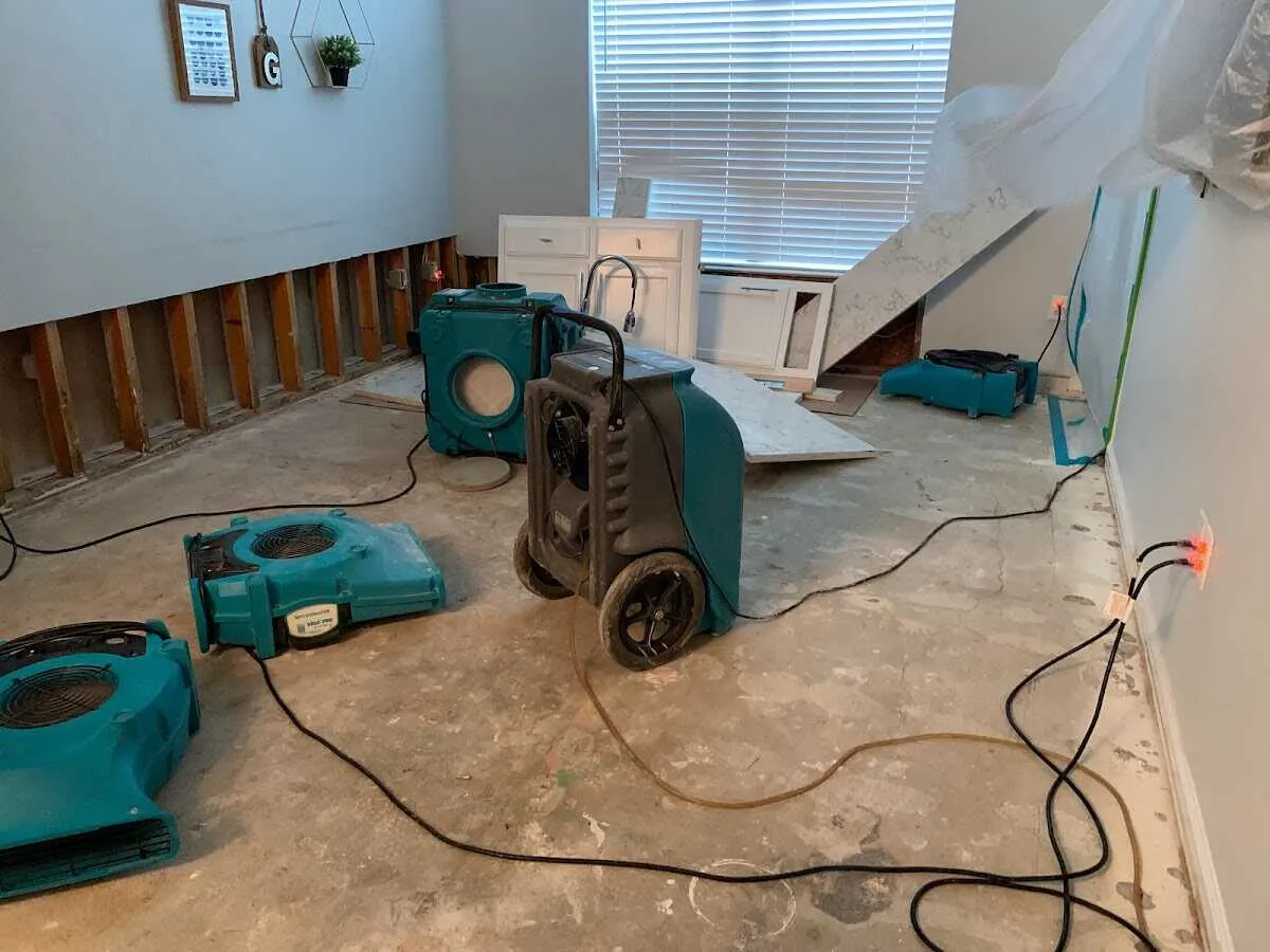 Dehumidifier in flood-cut room for Water Damage Restoration in River Park